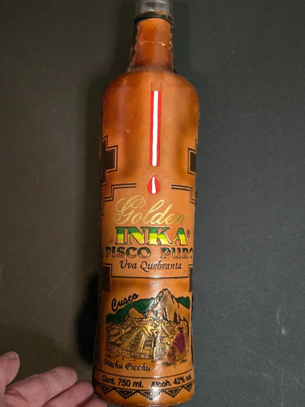 Vintage Leather wrapped and hand tooled Peruvian Pisco bottle